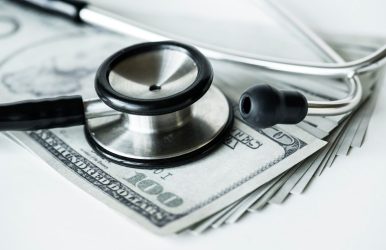 closeup-cash-stethoscope-healthcare-expenses-concept_53876-147497